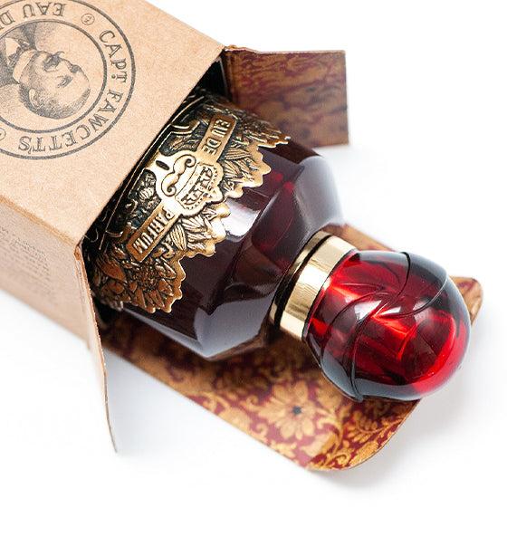 Eau de Parfum Maharajah von Captain Fawcett in edler roter Flasche mit goldverzierten Details und luxuriöser Verpackung.