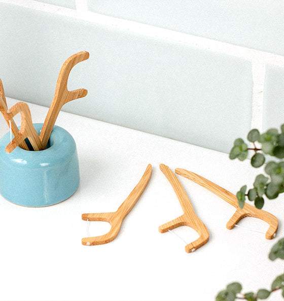Zahnseide Sticks aus Bambus von Hydrophil für umweltfreundliche Zahnpflege ohne Plastikmüll