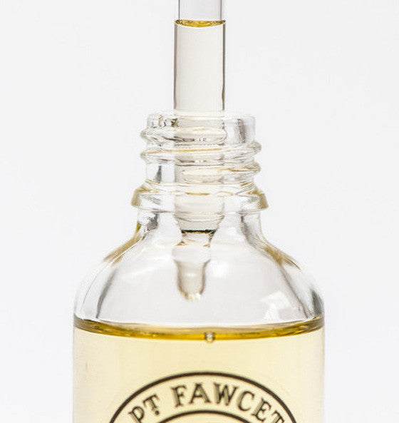 Flasche Bartöl Private Stock von Captain Fawcett mit Pipette und goldenem Öl zur Bartpflege