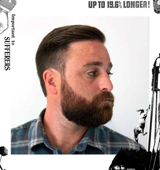 Mann mit gepflegtem Haar und Bart, gestylt mit Haarpomade Matte Pomade - Uppercut Deluxe für mittleren Halt und mattes Finish.