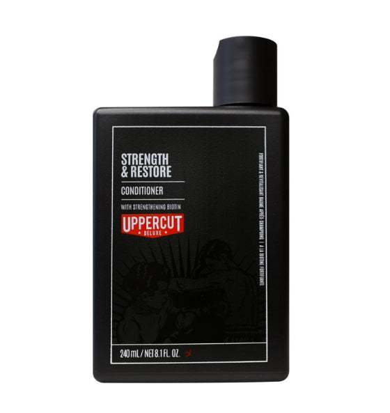 Uppercut Deluxe Strength and Restore Conditioner für gestärktes und regeneriertes Haar mit Biotin und Koffein in schwarzer Flasche