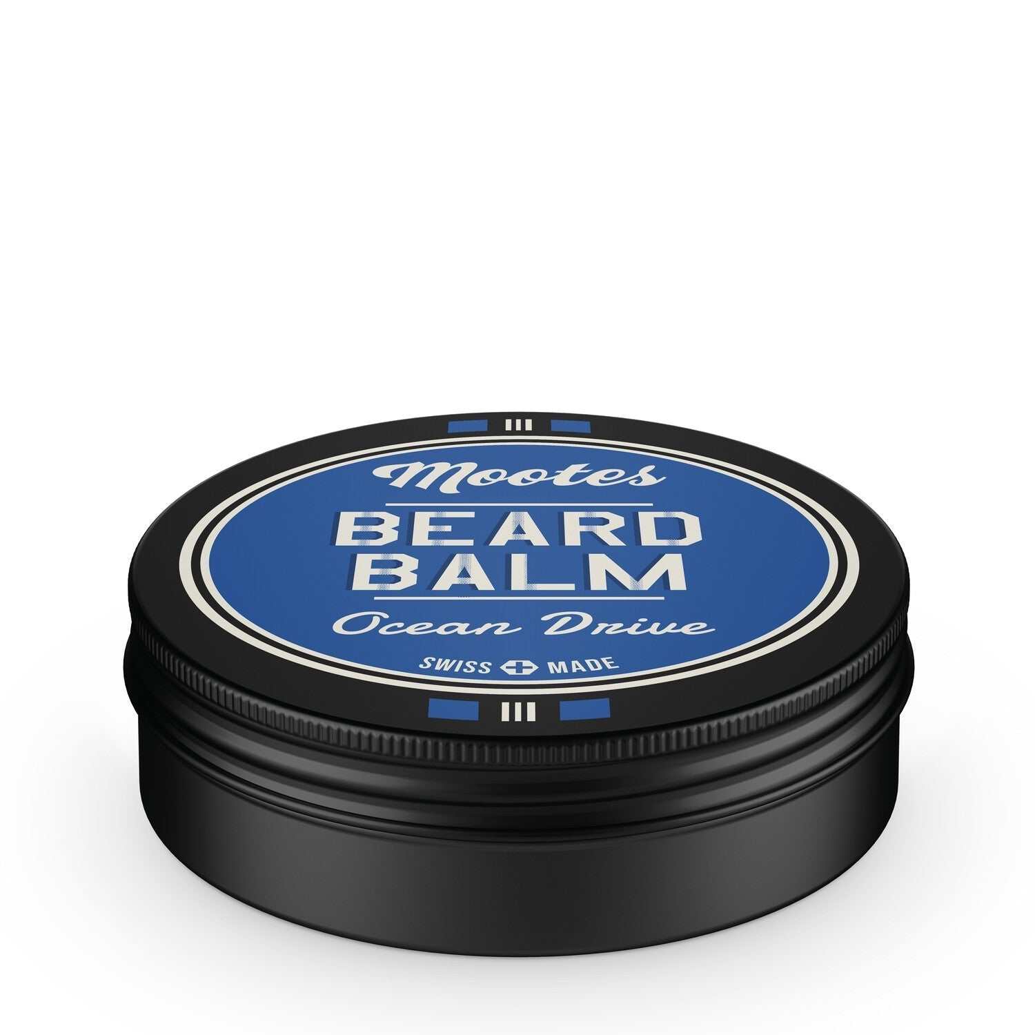 Bartbalsam Ocean Drive von Mootes in schwarzer Dose mit blauem Etikett, pflegt und stylt Bart mit natürlichem Halt und frischem, zitrisch-holzigem Duft.