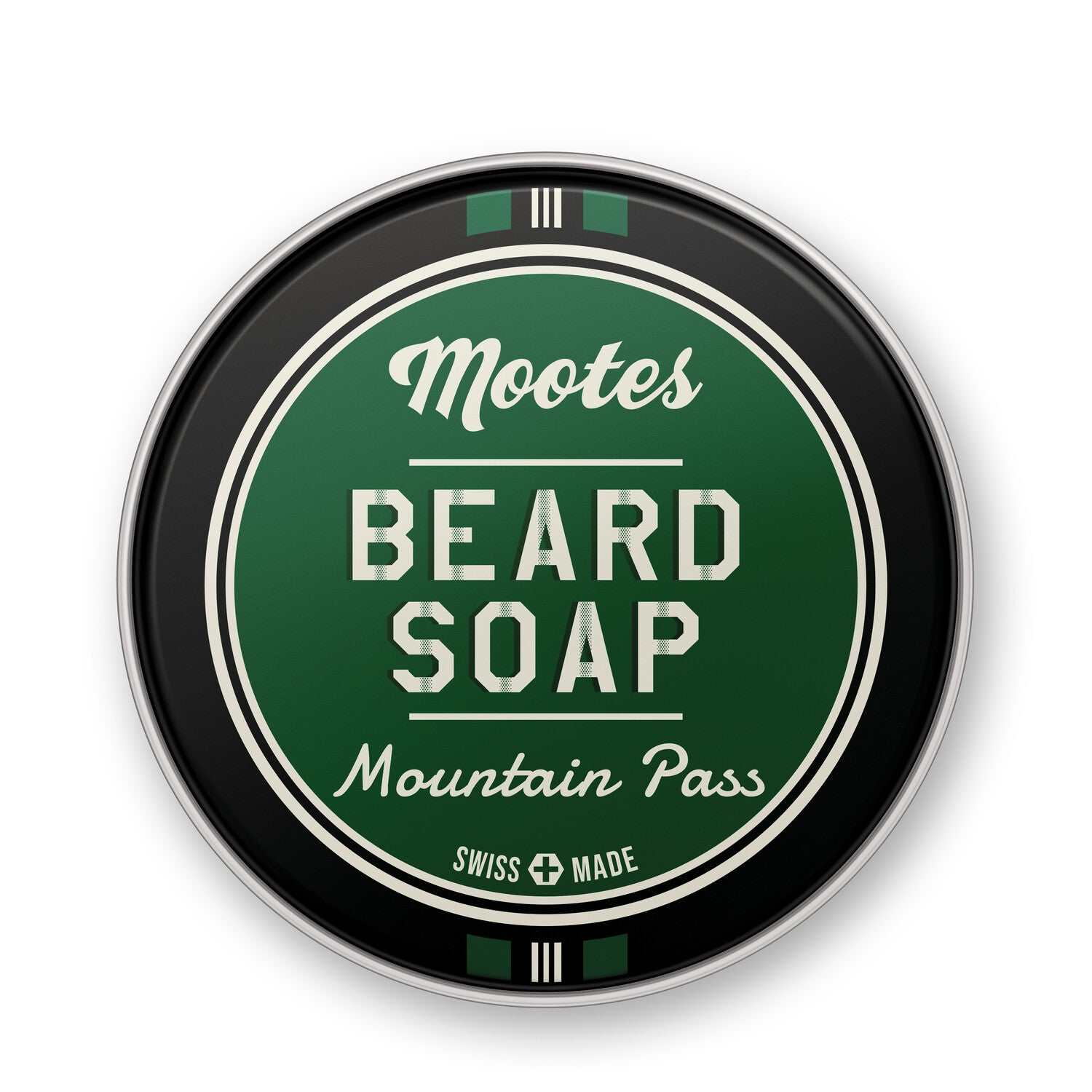 Bart- und Duschseife Mountain Pass von Mootes in schwarzer Aluminiumschale mit grünem Etikett, pflegend und reich an natürlichen Inhaltsstoffen.