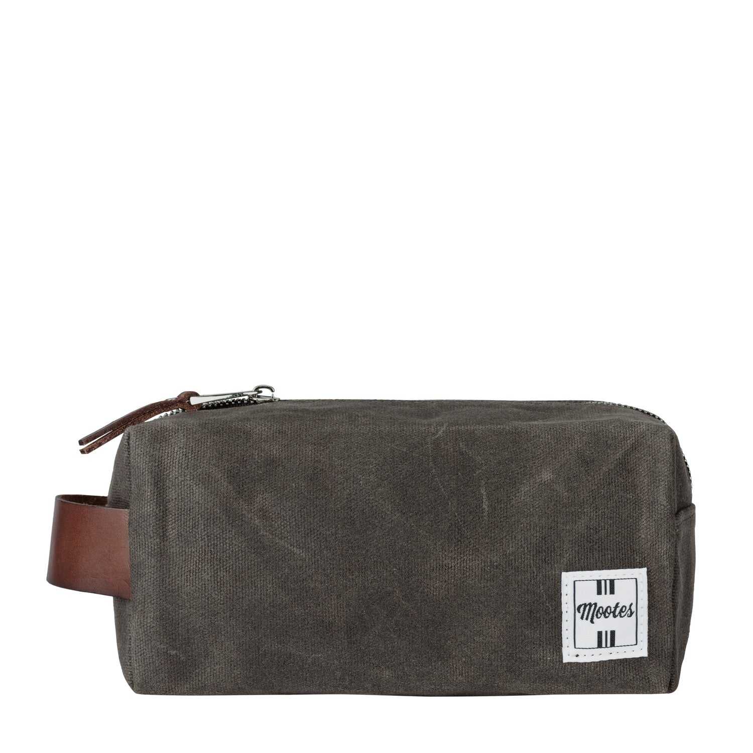 Necessaire Mootes aus robustem canvas mit braunem veganem ledergriff und reißverschluss in beigeton für reisepflegeprodukte