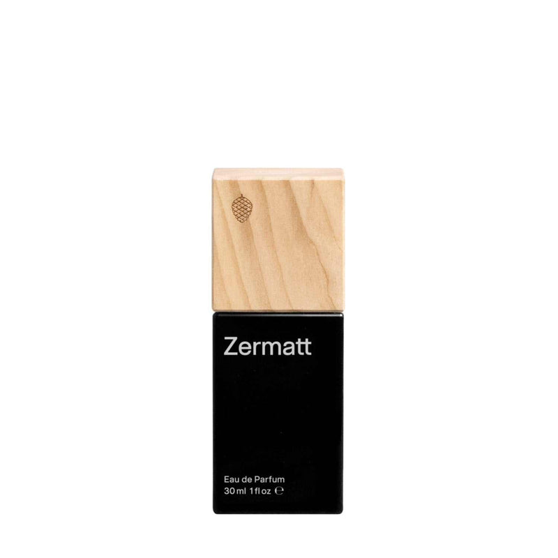 Eau de Parfum Zermatt von Favorit & Co mit elegantem schwarzem Flakon und Holzdeckel, 30 ml, Duft inspiriert von alpiner Frische und Berglandschaft.